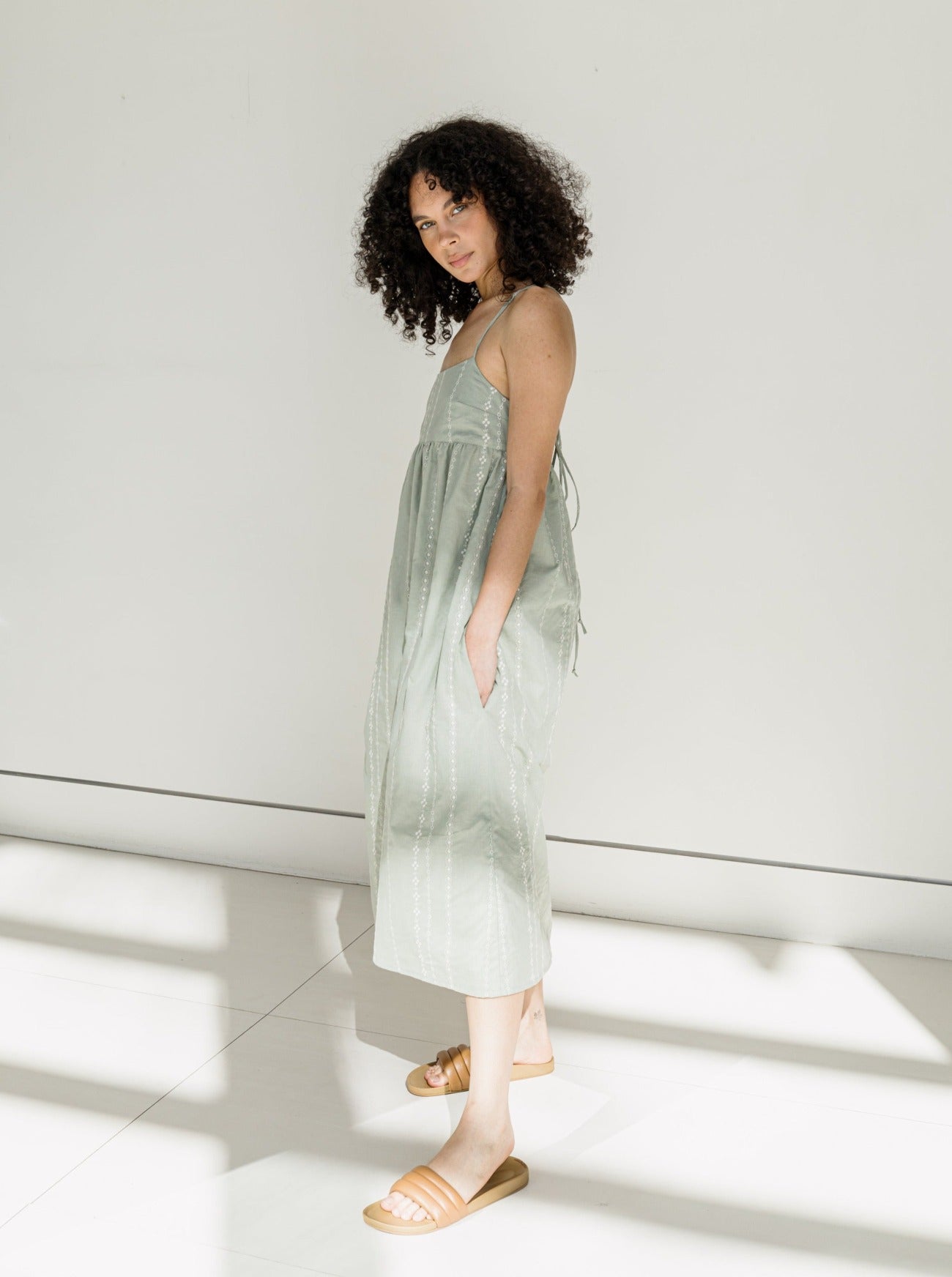 meredith sage embroidered midi dress side view